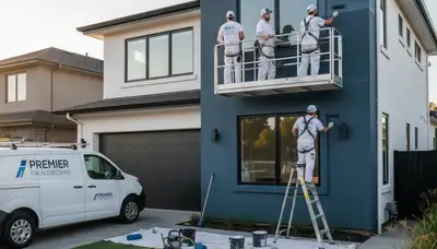 Professional exterior house painters working on a Chico, CA home with durable weatherproof coatings