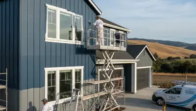 Professional house painters working on home exterior in Chico, CA